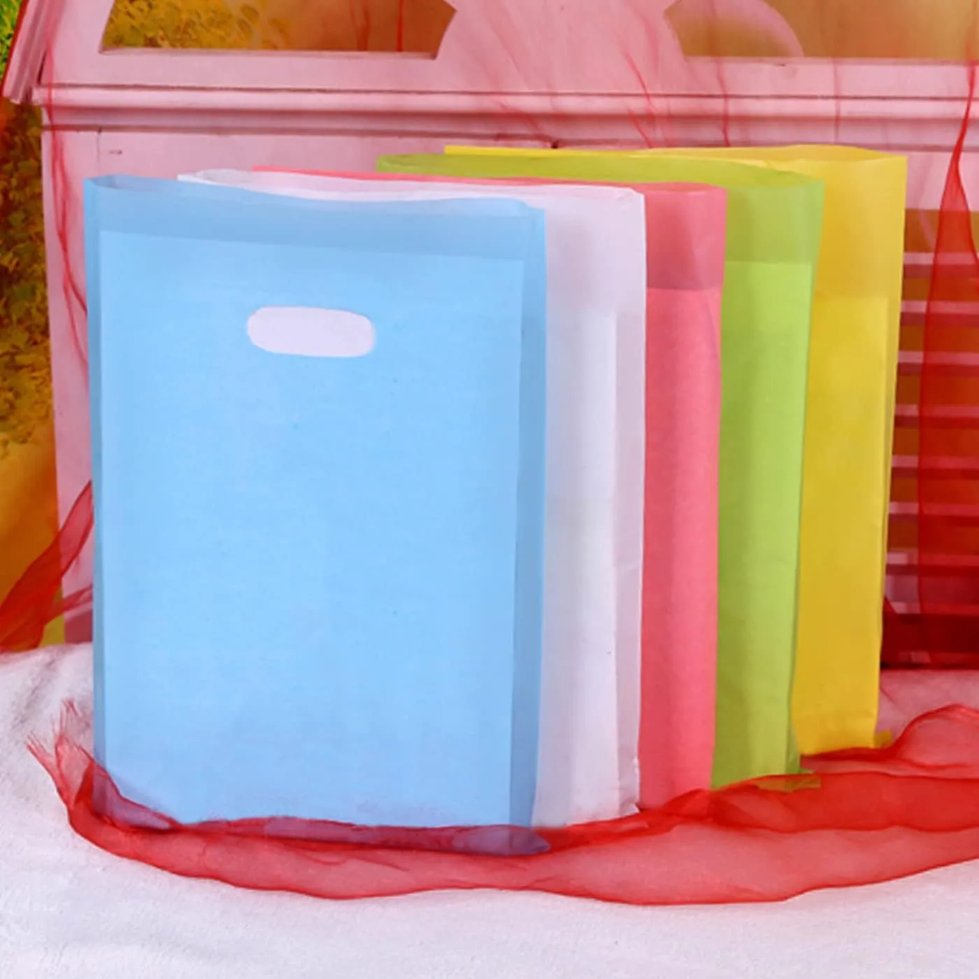 Plastic Party Favor Small Gift Bags, 100 PCS 6" x 8" Goodie Bags for Kids, Candy Treat Pouches Bulk with Handle for Kids' Birthday Party, Thanksgiving, Christmas, Halloween, 10 Colors